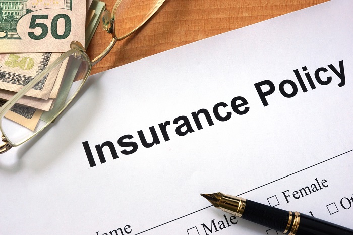 Insurance Policy Form with Pen