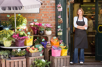 image of business owner outside of her kentucky flower shop